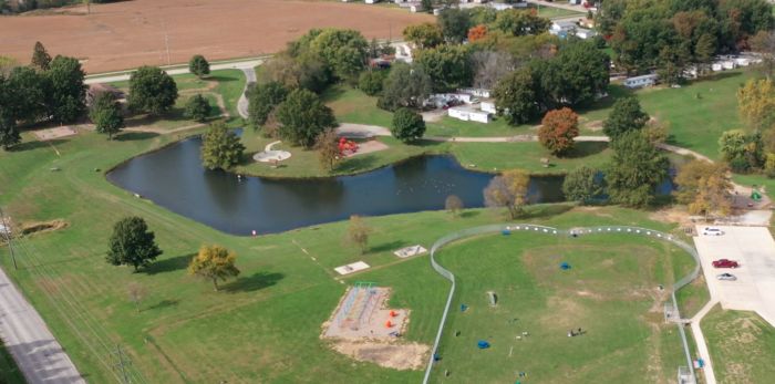 a golf course with a pond