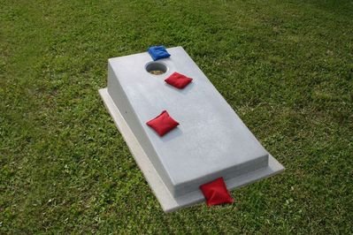 a white rectangular box with red and blue objects on it